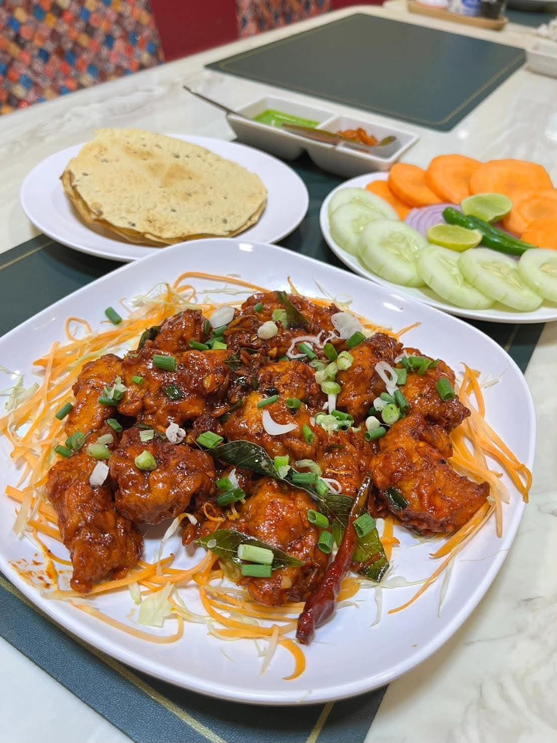 Chilli chicken with bell peppers and spring onions
